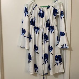 White dress with blue floral detail